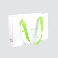 Shopping paper bag with handle