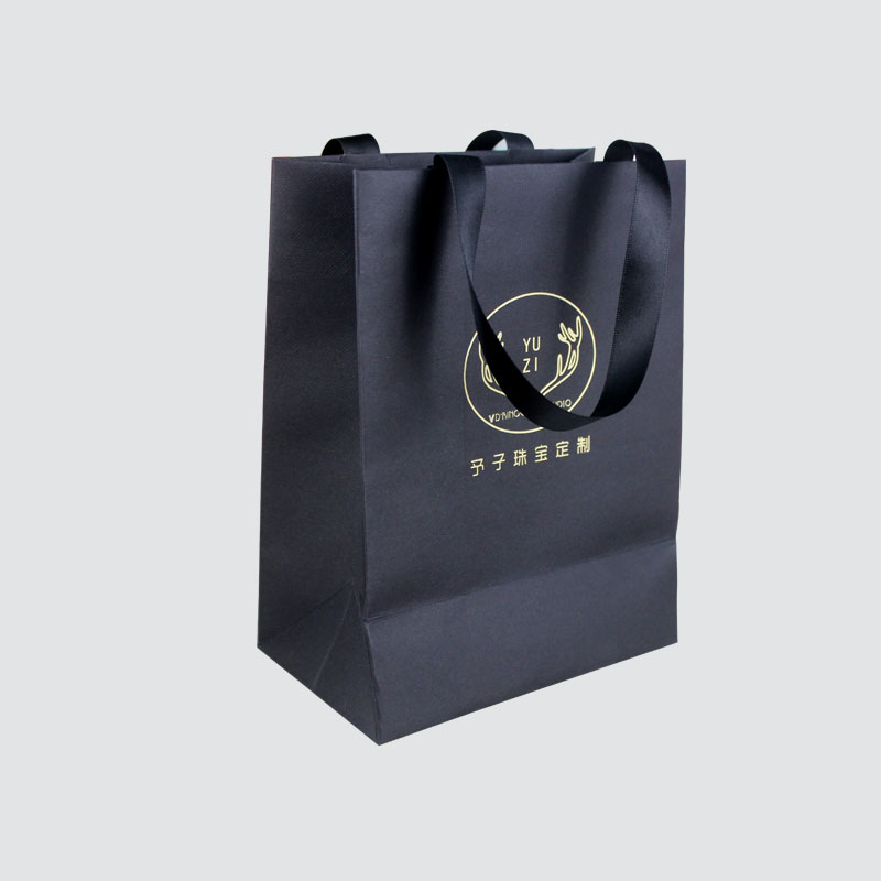 Shopping gift paper bag with ribbon